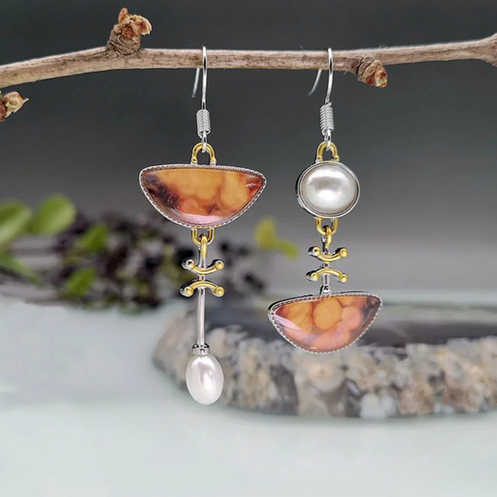 Boucles d'oreilles avec des pierres oranges naturelles pour une expression unique et colorée