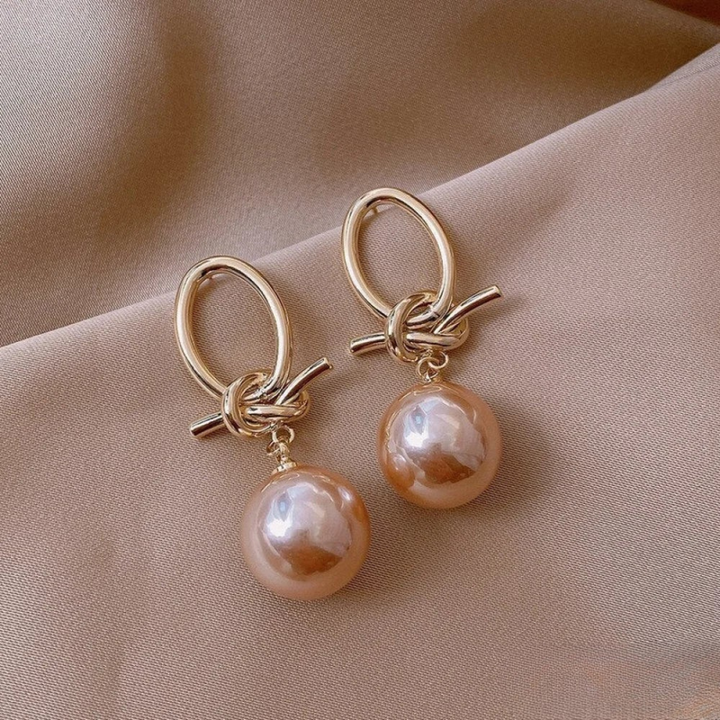 Boucles d'oreilles sophistiquées en perle pour un look intemporel