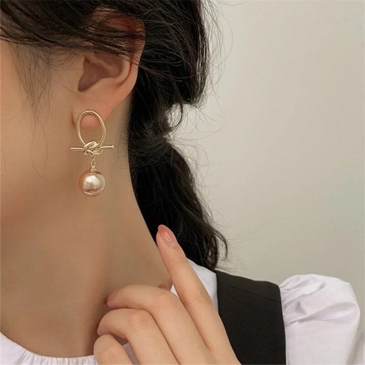 Boucles d'oreilles sophistiquées en perle pour un look intemporel