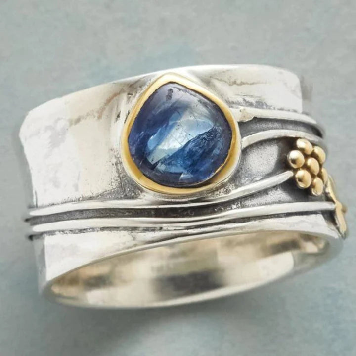 Bague vintage avec pierre bleue élégante