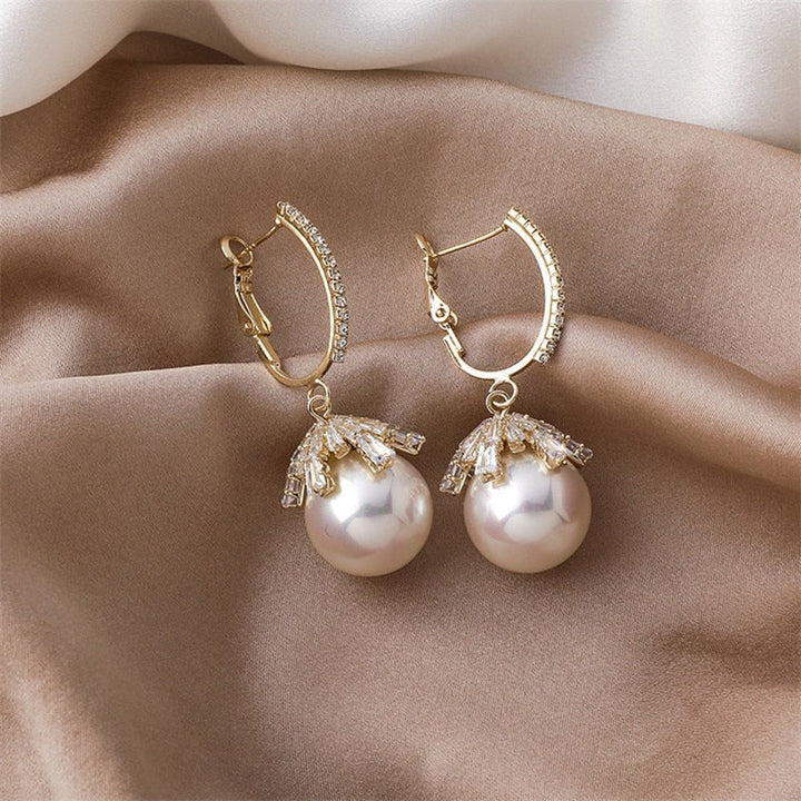 Boucles d'oreilles élégantes Malia avec perles pour un look sophistiqué