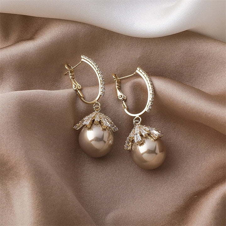 Boucles d'oreilles élégantes Malia avec perles pour un look sophistiqué