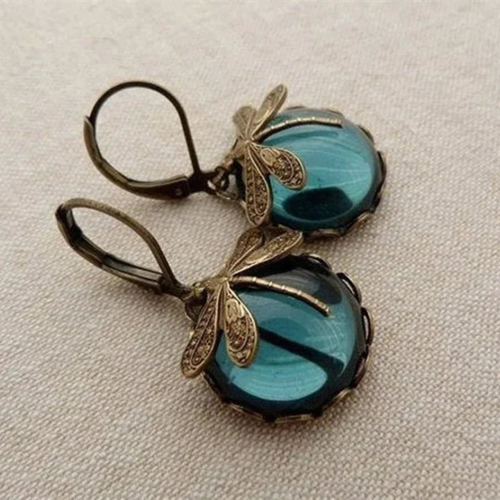 Boucles d'oreilles en or antique avec libellule