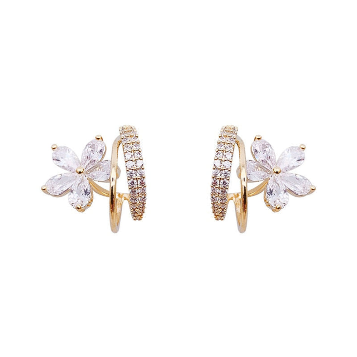 Boucles d'oreilles florales en or élégantes avec étincelle de zirconia éblouissante