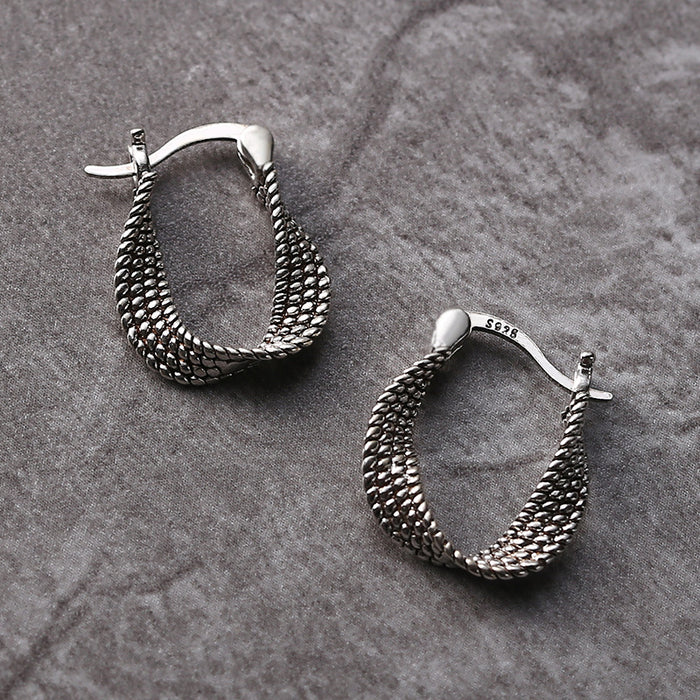 Boucles d'oreilles asymétriques en argent élégantes
