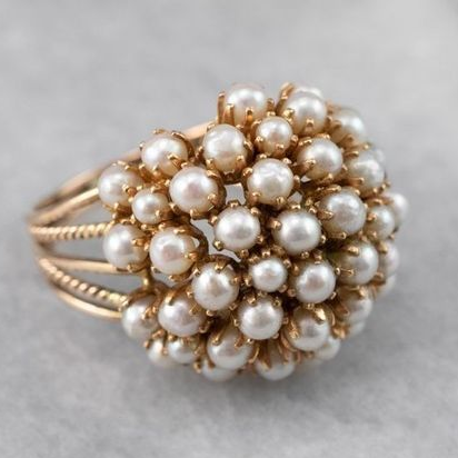 Bague ornée de perles d'exception pour une élégance intemporelle