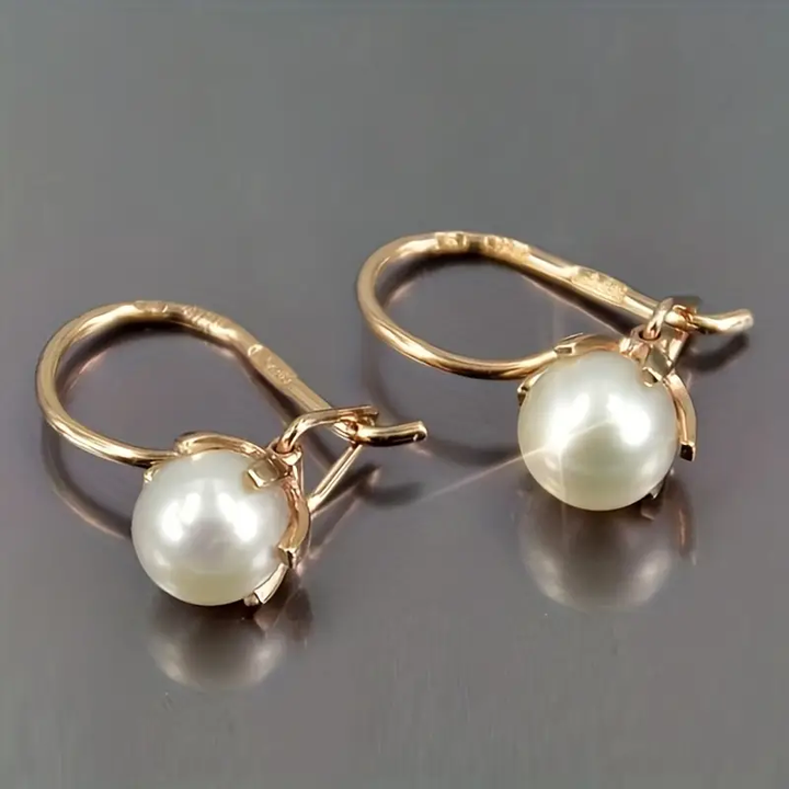 Boucles d'oreilles élégantes en or et perles pour un look sophistiqué
