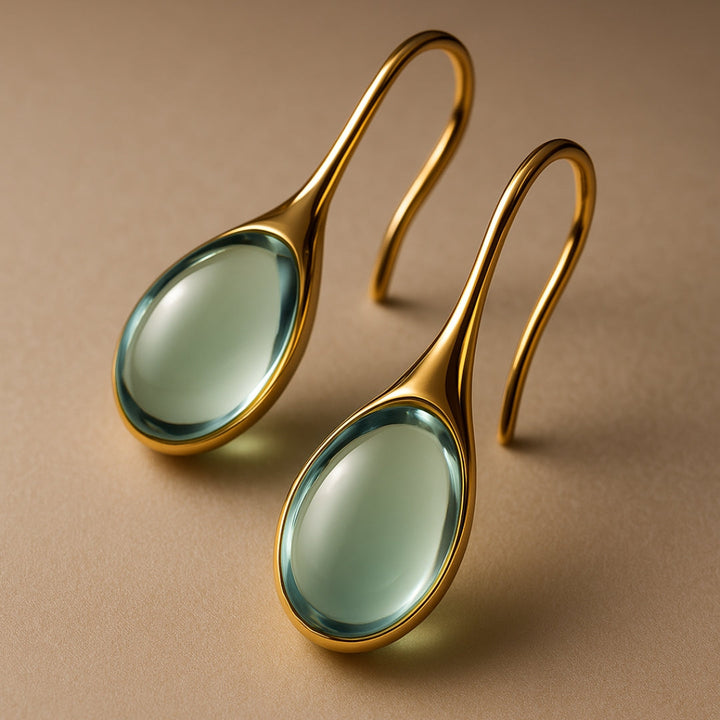 Boucles d'oreilles en cristal élégantes en forme de goutte en or et en argent