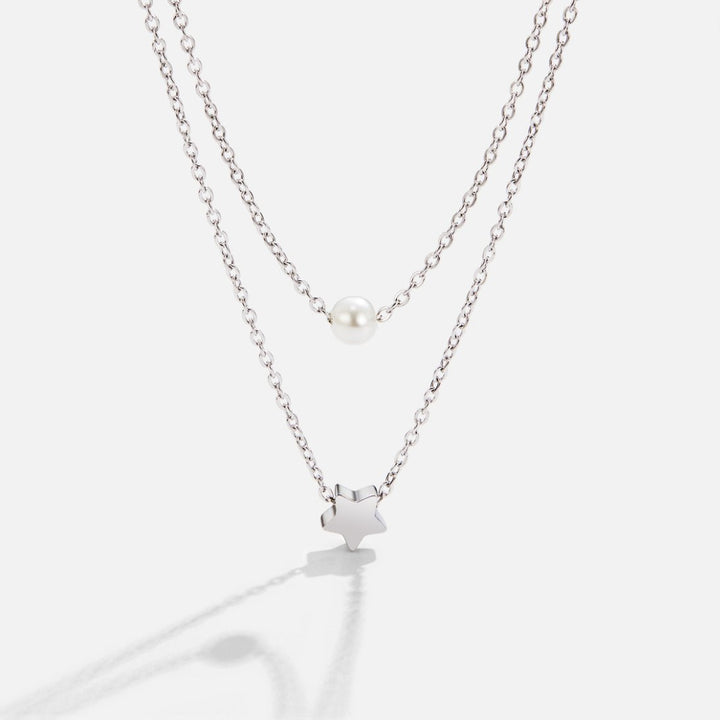 Collier en argent à étoiles et perles en couches