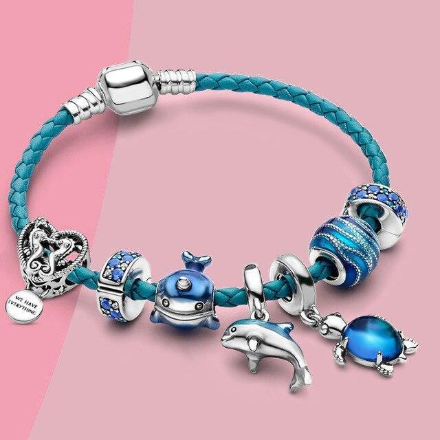 Bracelet inspiré par l'océan avec des charms en cuir élégant et en argent