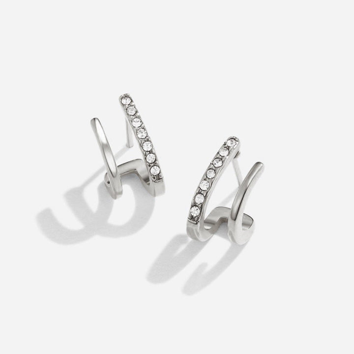 Boucles d'oreilles griffes en argent et cristal